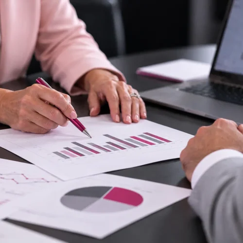Hands Reviewing Pharmacy Benefit Charts